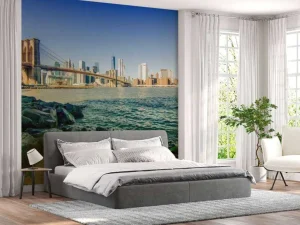 Clearance Brooklyn Bridge met een skyline op de achtergrond fotobehang Architectuur