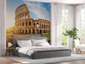 Discount Colosseum in Rome bij zonsopkomst fotobehang Architectuur