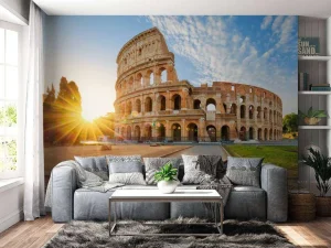Discount Colosseum in Rome bij zonsopkomst fotobehang Architectuur