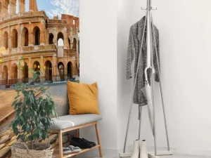 Discount Colosseum in Rome bij zonsopkomst fotobehang Architectuur