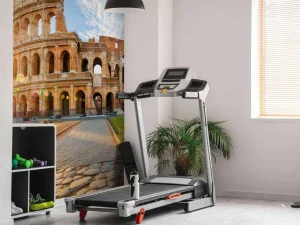 Discount Colosseum in Rome bij zonsopkomst fotobehang Architectuur