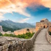 Online De Chinese Muur bij zonsondergang fotobehang Architectuur