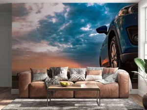 Outlet Een blauwe SUV met een unieke lucht op de achtergrond fotobehang Kinderkamer | Transport