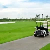 Clearance Golfbaan met een golfwagen fotobehang Sport