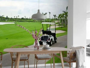 Clearance Golfbaan met een golfwagen fotobehang Sport