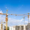Best Hijskranen aan het werk fotobehang Architectuur