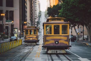 Online Klassieke trams in San Francisco fotobehang Transport | Architectuur