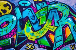 Online Kleurrijke graffiti creatie op een muur fotobehang Tienerkamer | Kunst & Design