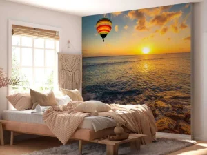 Clearance Luchtballon boven zee bij zonsondergang fotobehang Transport
