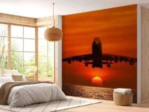 Best Passagiersvliegtuig boven de zee bij zonsondergang fotobehang Transport
