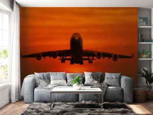 Best Passagiersvliegtuig boven de zee bij zonsondergang fotobehang Transport