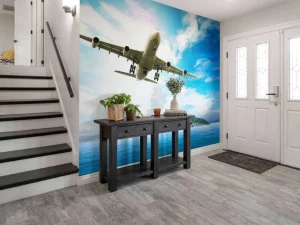 Best Passagiersvliegtuig boven een tropische zee fotobehang Tienerkamer | Transport