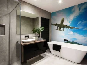 Best Passagiersvliegtuig boven een tropische zee fotobehang Tienerkamer | Transport