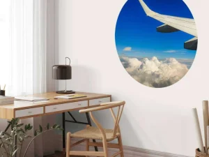 Outlet Prachtige wolken vanuit een vliegtuigraam fotobehang Transport