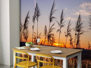 Hot Rivier met riet bij zonsondergang fotobehang Bloemen