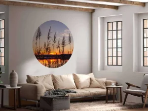 Hot Rivier met riet bij zonsondergang fotobehang Bloemen
