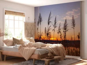 Hot Rivier met riet bij zonsondergang fotobehang Bloemen