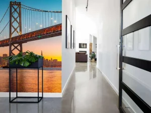 Online San Francisco-Oakland Bay Bridge in de avond fotobehang Architectuur