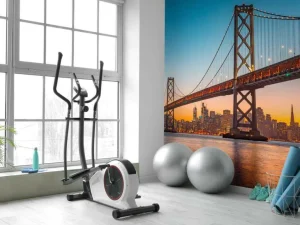 Online San Francisco-Oakland Bay Bridge in de avond fotobehang Architectuur