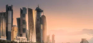 Discount Skyline van Doha in de avond fotobehang Architectuur