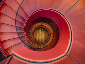 Sale Spiraalvormige rode trap fotobehang Kunst & Design | Architectuur