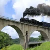 Fashion Stoomtrein op een viaduct fotobehang Transport | Architectuur