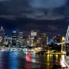 Sale Sydney in de avond fotobehang Architectuur