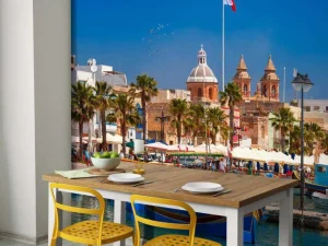 Outlet Traditionele boten in de haven van Marsaxlokk, Malta fotobehang Transport | Architectuur