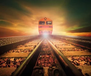 Hot Trein bij zonsondergang fotobehang Transport