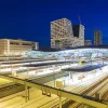 Online Utrecht Centraal Station in de avond fotobehang Architectuur