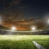 Outlet Verlicht voetbalstadion met wolken fotobehang Tienerkamer | Kinderkamer