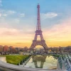 Discount Verlichte Eiffeltoren bij zonsondergang fotobehang Architectuur