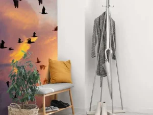 Clearance Vliegende aalscholvers bij zonsondergang fotobehang Dieren