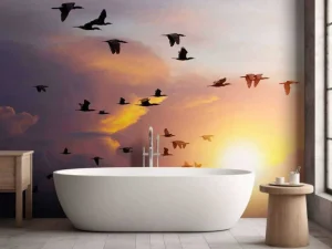 Clearance Vliegende aalscholvers bij zonsondergang fotobehang Dieren