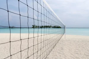 Clearance Volleybalnet op een Tropisch strand fotobehang Tienerkamer