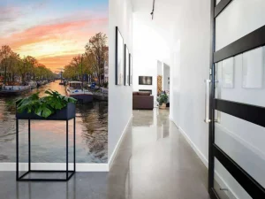 Outlet Zonsondergang in Amsterdam fotobehang Steden | Architectuur